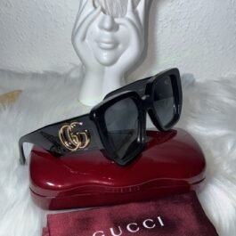 Lunettes de soleil Gucci Noir Logo GG Or