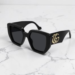 Lunettes de soleil Gucci Noir Logo GG Or