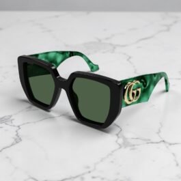 Lunettes de soleil Gucci Vert Logo GG Or