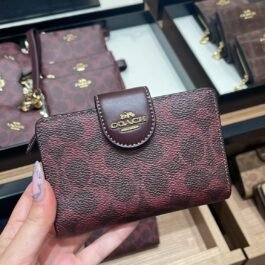 Portefeuille moyen à zip en coin Coach Cassis